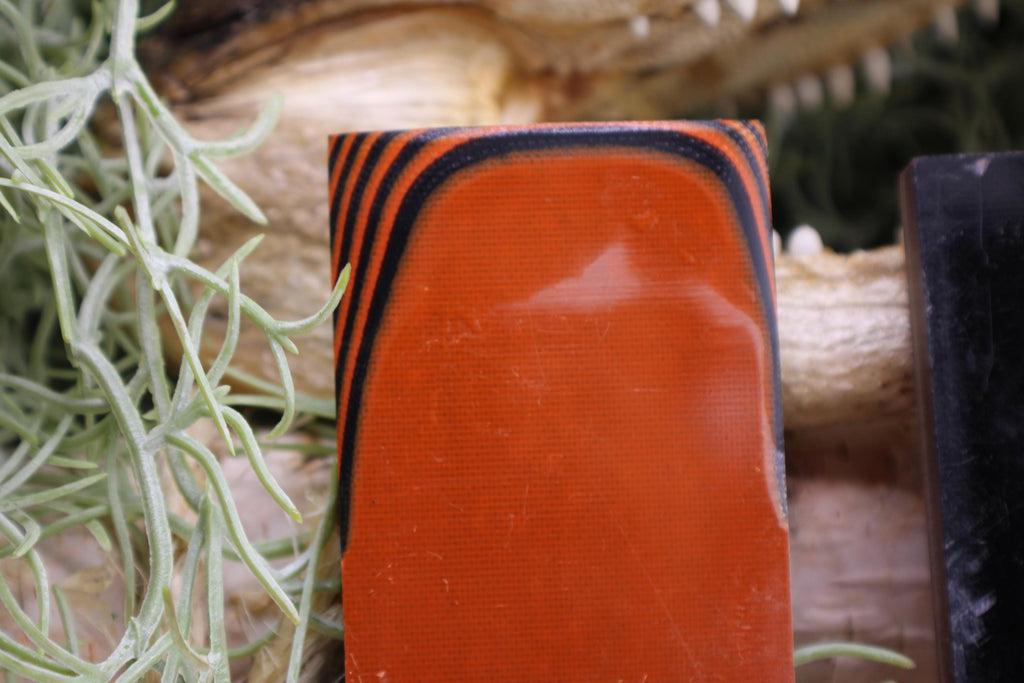 Knife Handle Pair Black and Burnt Orange G10 approximately 6.25x 2 x .25