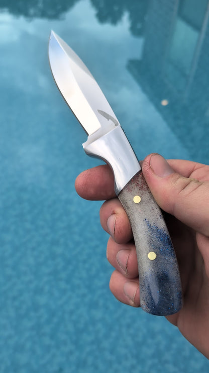 Completed Drop point hunter with Red White and Blue resin handle