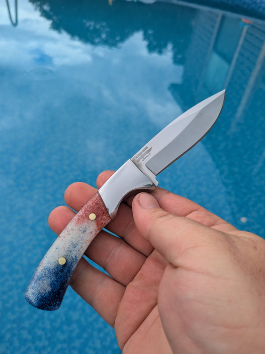 Completed Drop point hunter with Red White and Blue resin handle