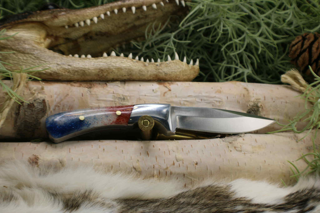 Completed Drop point hunter with Red White and Blue resin handle
