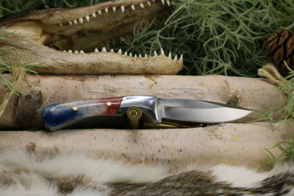 Completed Drop point hunter with Red White and Blue resin handle